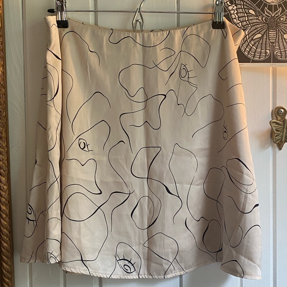 Princess Polly satin abstract pattern skirt